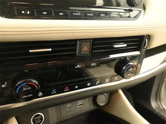 Photo of 2023 Pearl White Tri-Coat Nissan Rogue
