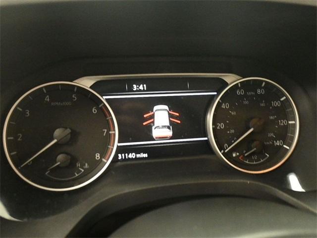 Photo of 2023 Pearl White Tri-Coat Nissan Rogue