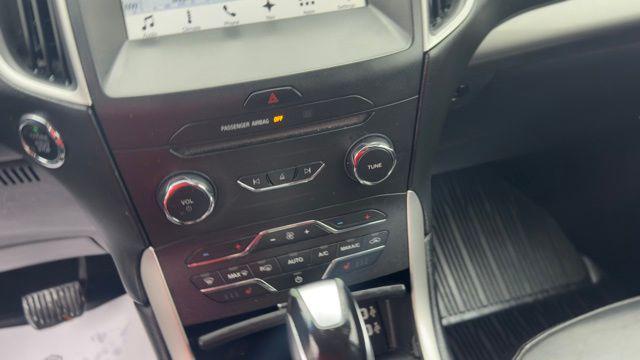 Photo of 2017 Burgundy Ford Edge