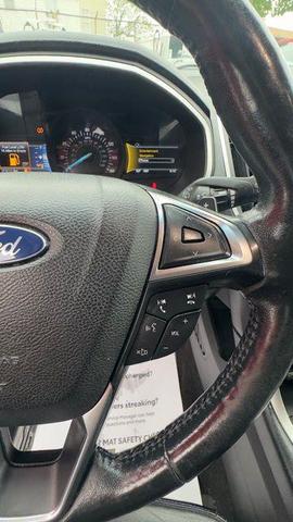 Photo of 2017 Burgundy Ford Edge