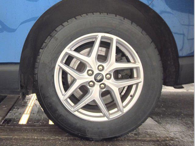 Photo of 2024 Atlas Blue Metallic Ford Edge