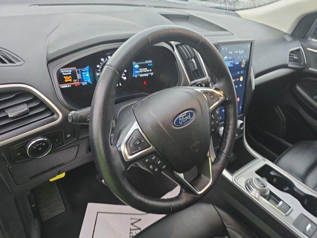 Photo of 2024 Atlas Blue Metallic Ford Edge