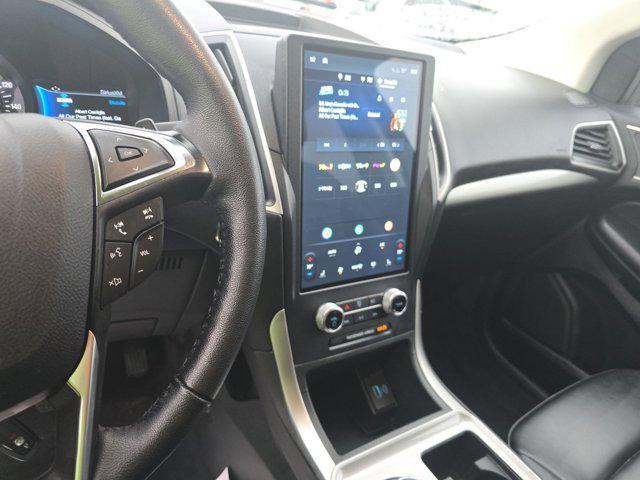 Photo of 2024 Atlas Blue Metallic Ford Edge