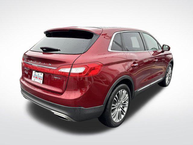 Photo of 2018 Ruby Red Metallic Cc Lincoln MKX