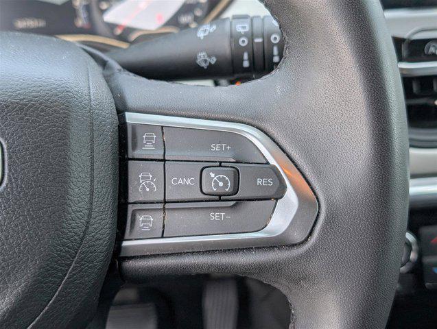 Photo of 2023 Laser Blue Pearlcoat Jeep Compass