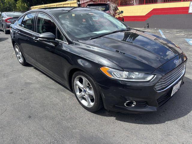 Photo of 2014 Tuxedo Black Metallic Ford Fusion