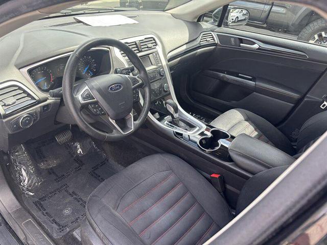 Photo of 2014 Tuxedo Black Metallic Ford Fusion