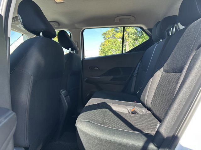 Photo of 2024 Aspen White Tricoat Nissan Kicks