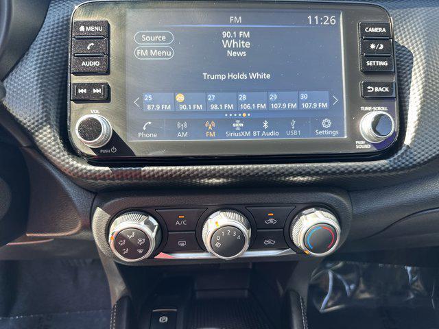 Photo of 2024 Aspen White Tricoat Nissan Kicks