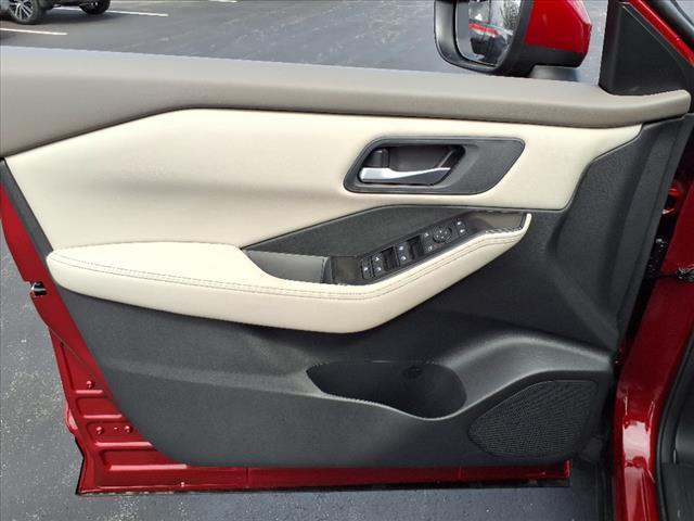 Photo of 2025 Scarlet Ember Tintcoat Nissan Rogue