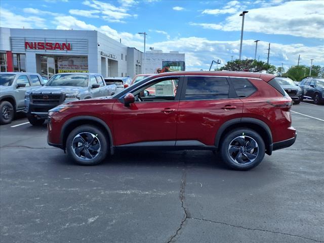 Photo of 2025 Scarlet Ember Tintcoat Nissan Rogue