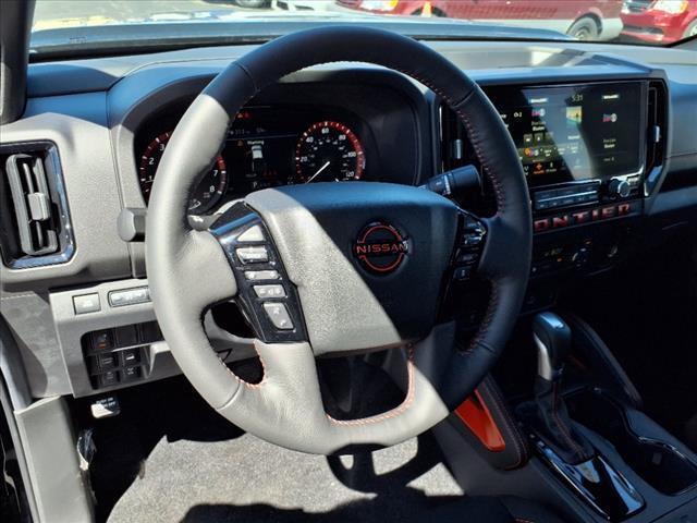 Photo of 2025 Super Black Nissan Frontier