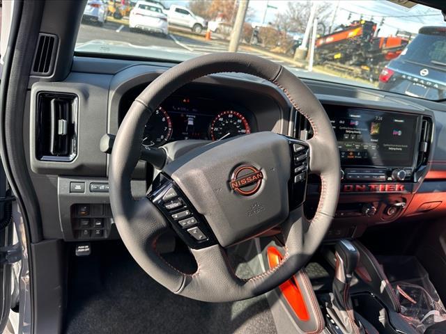Photo of 2025 Boulder Gray Pearl Nissan Frontier