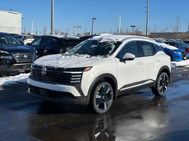 Photo of 2025 Aspen White Tricoat Nissan Kicks
