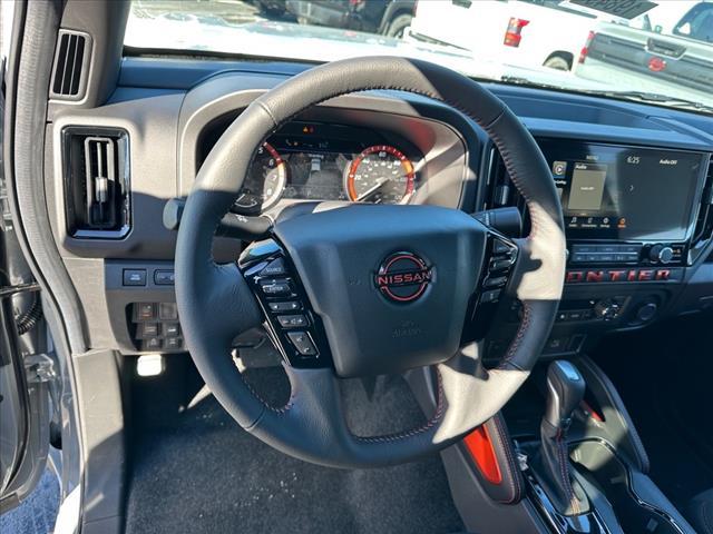 Photo of 2025 Boulder Gray Pearl Nissan Frontier
