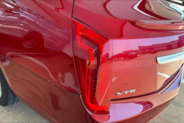 Photo of 2014 Crystal Red Tintcoat Cadillac XTS
