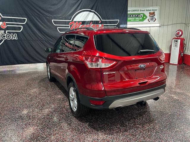 Photo of 2014 Ruby Red Tinted Clearcoat Ford Escape
