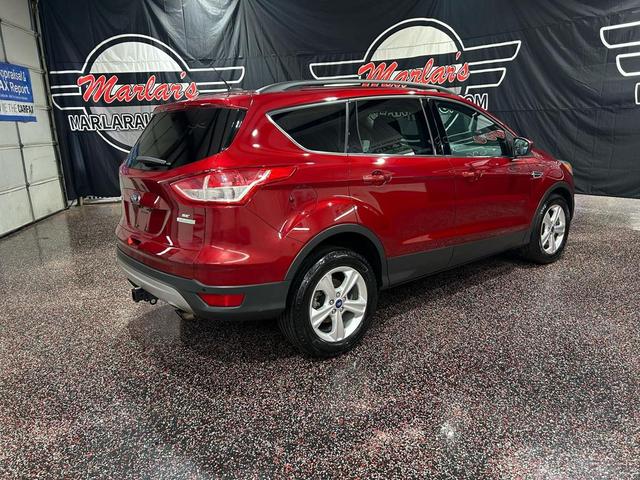 Photo of 2014 Ruby Red Tinted Clearcoat Ford Escape