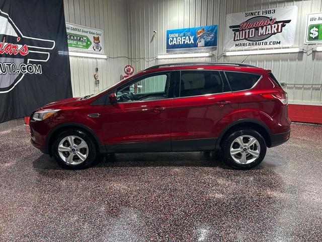 Photo of 2014 Ruby Red Tinted Clearcoat Ford Escape