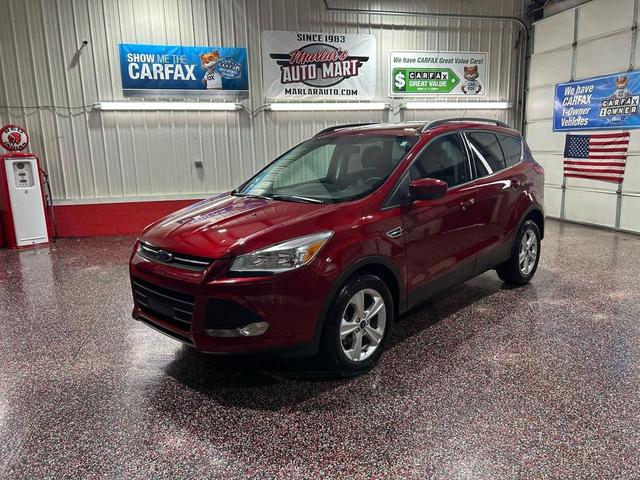 Photo of 2014 Ruby Red Tinted Clearcoat Ford Escape