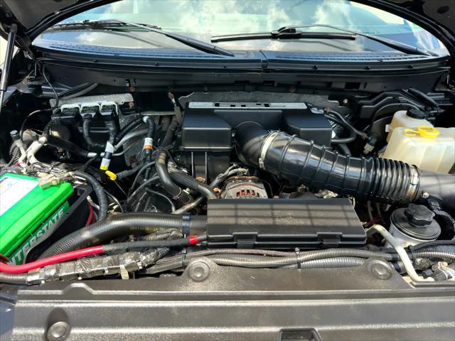 Photo of 2013 Dark Green Ford F-150