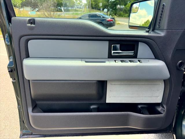 Photo of 2013 Dark Green Ford F-150