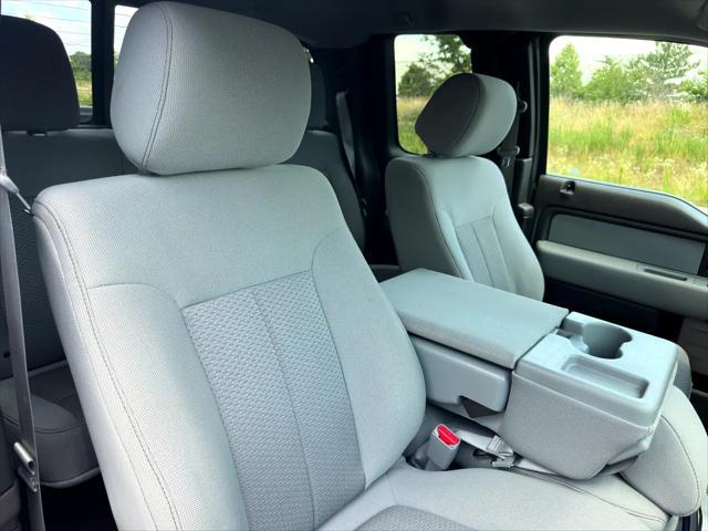 Photo of 2013 Dark Green Ford F-150