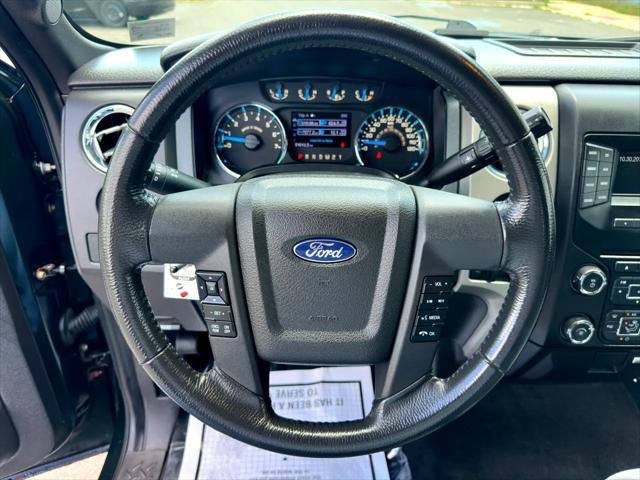 Photo of 2013 Dark Green Ford F-150