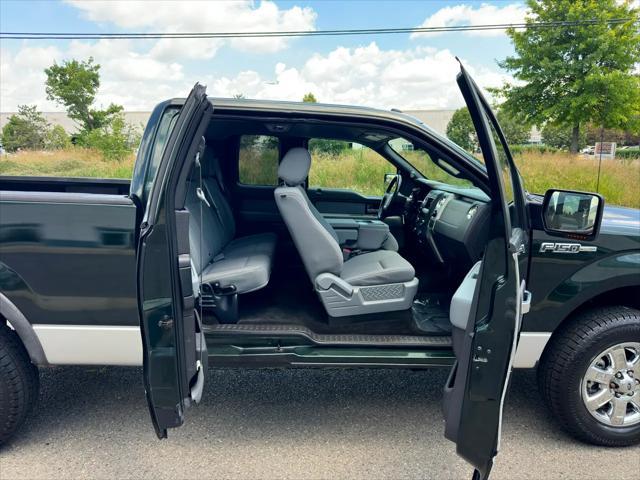 Photo of 2013 Dark Green Ford F-150