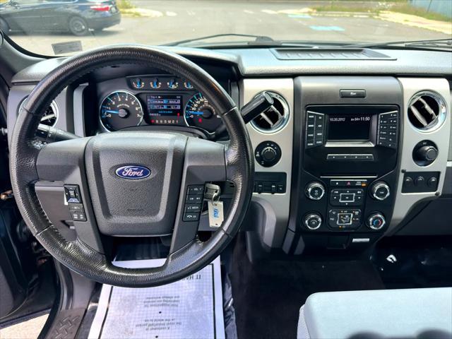 Photo of 2013 Dark Green Ford F-150
