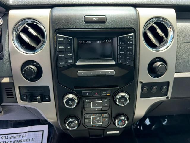 Photo of 2013 Dark Green Ford F-150