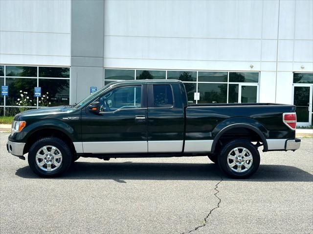 Photo of 2013 Dark Green Ford F-150