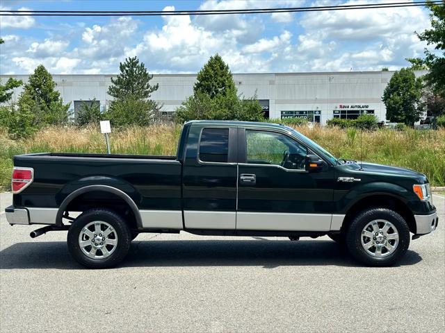 Photo of 2013 Dark Green Ford F-150
