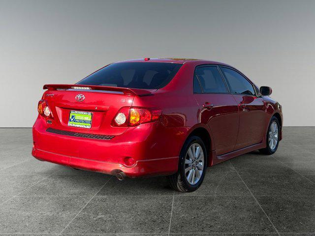 Photo of 2010 Barcelona Red Metallic Toyota Corolla
