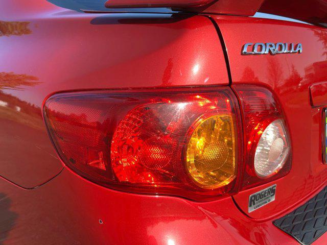 Photo of 2010 Barcelona Red Metallic Toyota Corolla