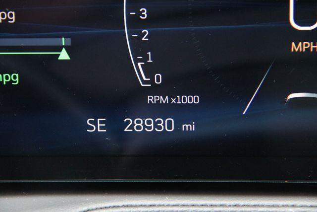 Photo of 2024 Stellar Black Metallic Cadillac XT4