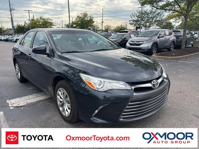 Photo of 2016 Midnight Black Metallic Toyota Camry