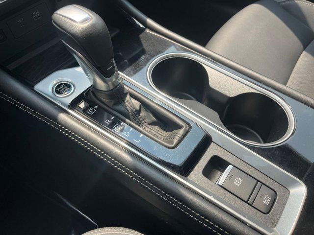 Photo of 2024 Pearl White Tricoat Nissan Altima