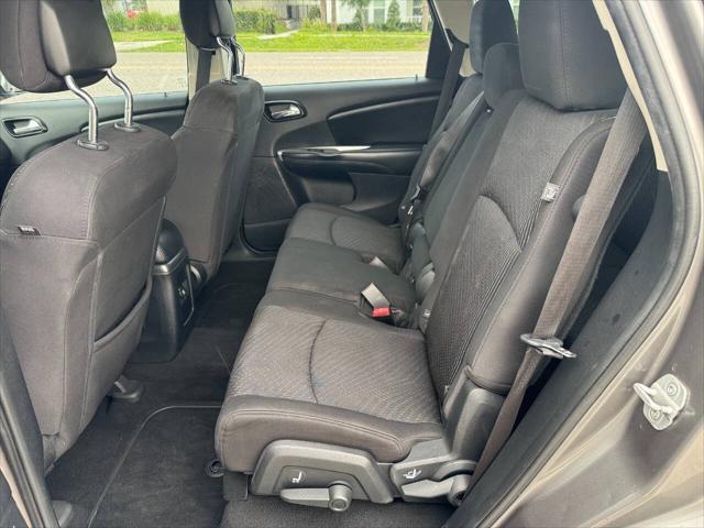 Photo of 2013 Storm Gray Pearlcoat Dodge Journey