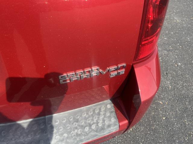 Photo of 2010 Inferno Red Crystal PC/Mineral Gray Met CC Dodge Grand Caravan