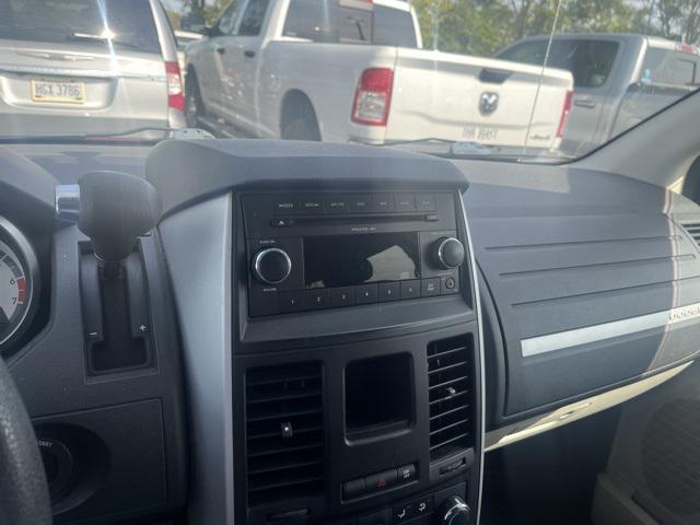 Photo of 2010 Inferno Red Crystal PC/Mineral Gray Met CC Dodge Grand Caravan