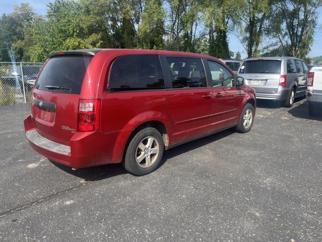 Photo of 2010 Inferno Red Crystal PC/Mineral Gray Met CC Dodge Grand Caravan