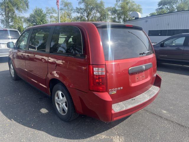 Photo of 2010 Inferno Red Crystal PC/Mineral Gray Met CC Dodge Grand Caravan