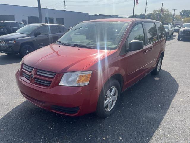 Photo of 2010 Inferno Red Crystal PC/Mineral Gray Met CC Dodge Grand Caravan
