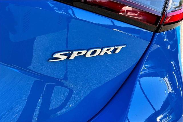 Photo of 2022 Boost Blue Pearl Honda Civic