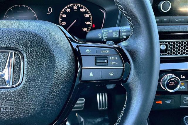 Photo of 2022 Boost Blue Pearl Honda Civic