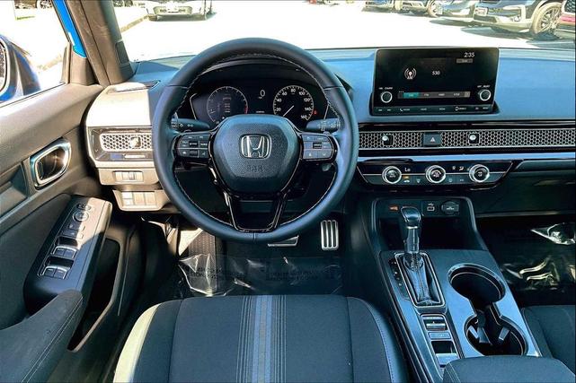 Photo of 2022 Boost Blue Pearl Honda Civic
