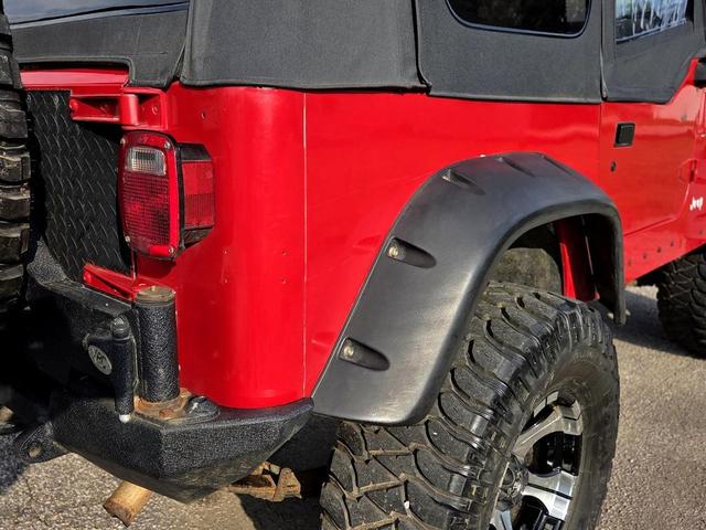Photo of 1995 Red Jeep Wrangler