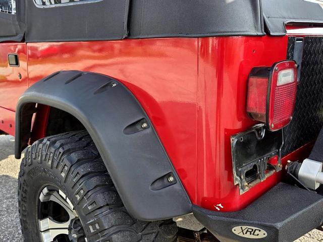 Photo of 1995 Red Jeep Wrangler