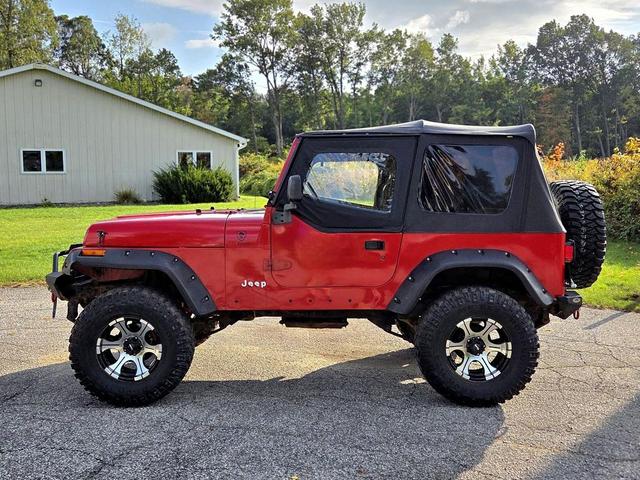 Photo of 1995 Red Jeep Wrangler
